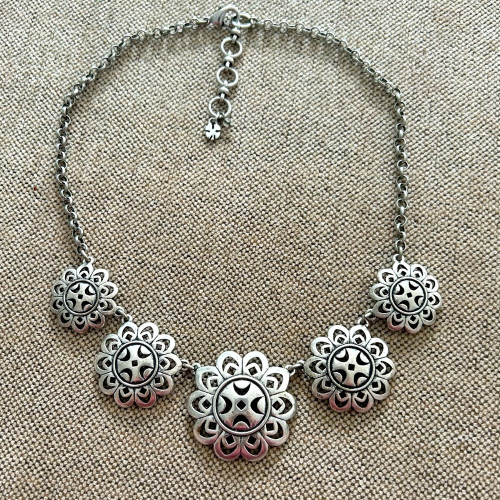 Silver tone 16” necklace with 1.5” extender. 5 graduated medallions. Link chain